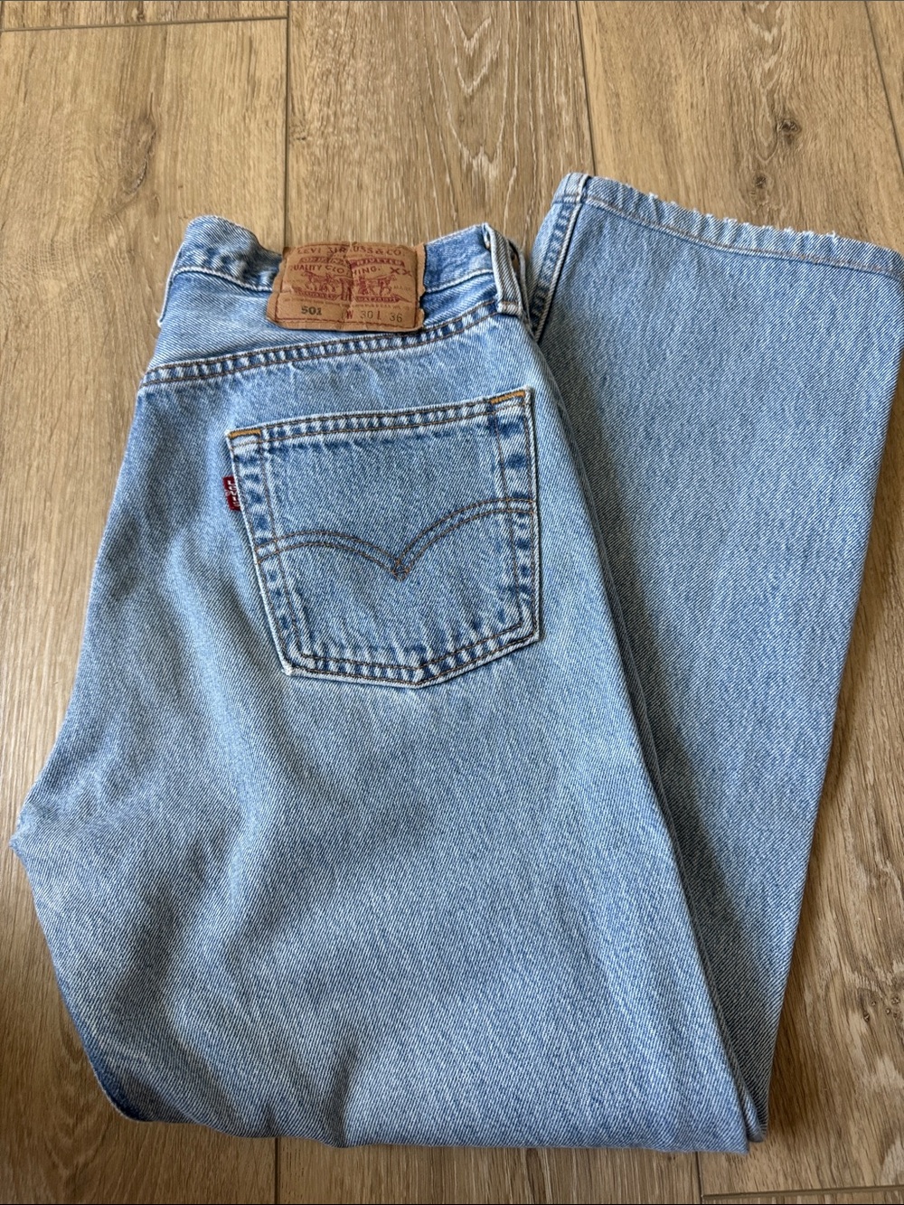 Vintage Levis 501 Straight-Leg Jeans in Light Blue Wash.  labeled W 30” L 36”